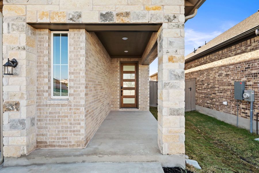 Exterior details and patio area of a home in Flora, Hutto (Image 3).