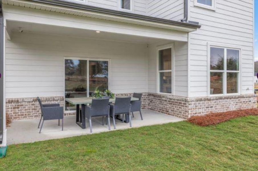Front exterior of a new home in The Estates at Gainesville Township, Gainesville, GA, highlighting curb appeal (Image 19).