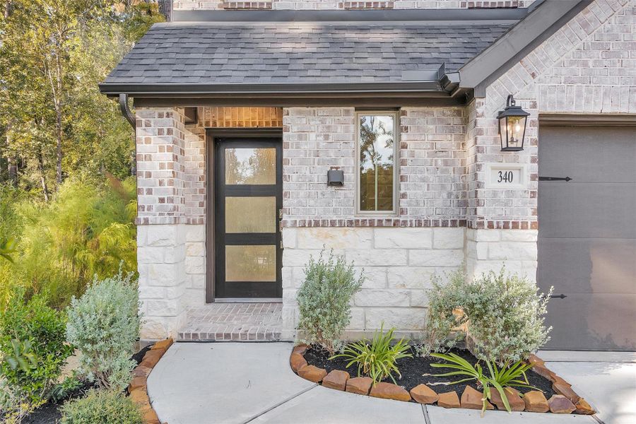 Exterior details and patio area of a home in Woodforest 40', Montgomery (Image 28). Exterior details and patio area of a home in Woodforest 40', Montgomery (Image 28).
