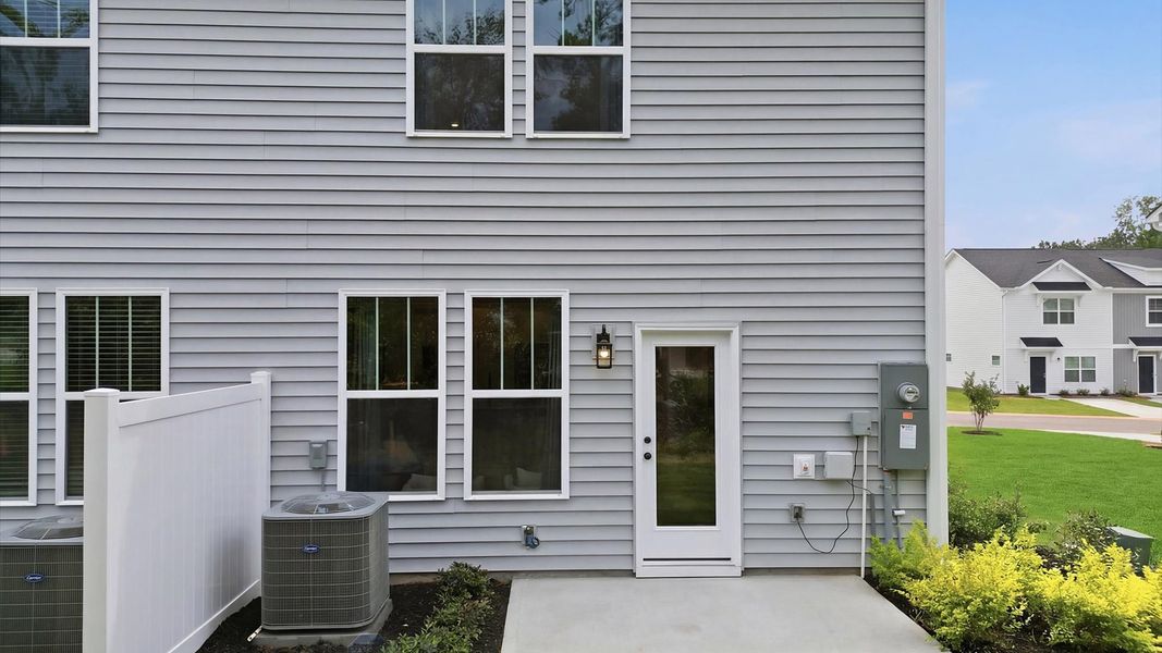 Exclusive backyard with accomplished detail and elevated outdoor living potential at Clarke Townes