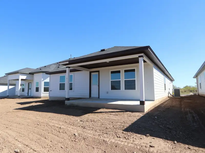 Exterior details and patio area of a home in Marble Creek Crossing, Austin (Image 15). Exterior details and patio area of a home in Marble Creek Crossing, Austin (Image 15).