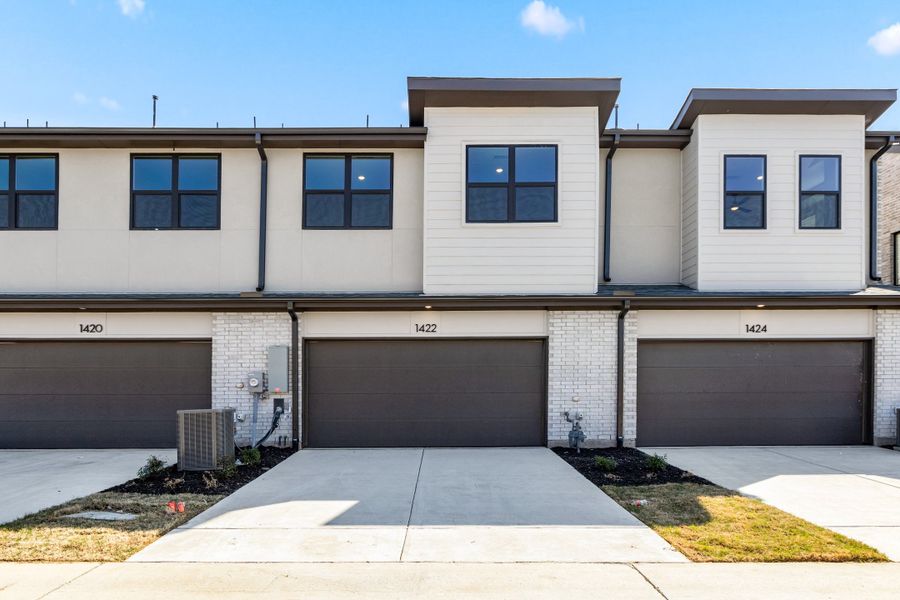 Front exterior of a new home in Willow Grove Townhomes, Melissa, TX, highlighting curb appeal (Image 26).