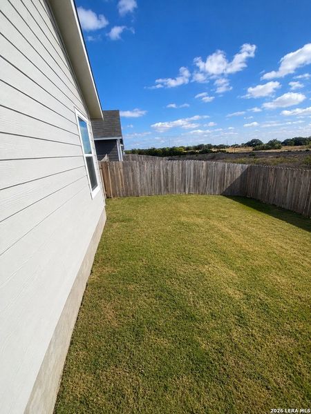 Exterior details and patio area of a home in Bertram Oaks, Bertram (Image 2). Exterior details and patio area of a home in Bertram Oaks, Bertram (Image 2).