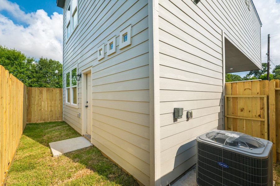 Exterior details and patio area of a home in , Houston (Image 3). Exterior details and patio area of a home in , Houston (Image 3).
