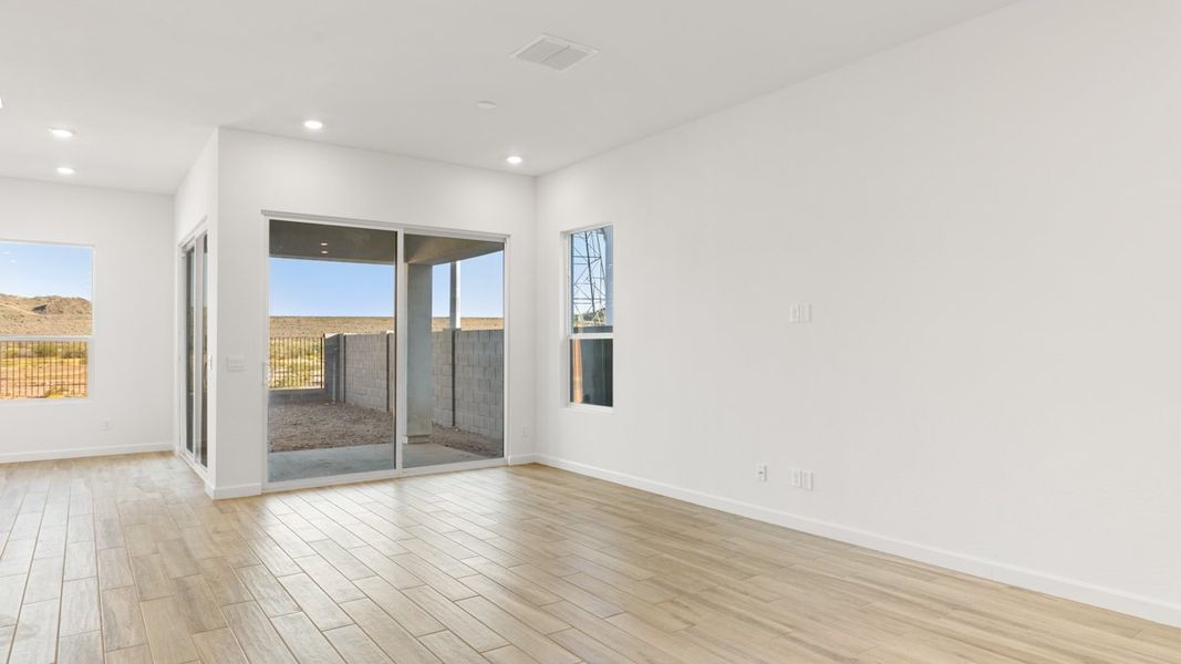 Spacious, unfurnished interior of a new home in The Ridge at Stone Butte, Phoenix (Image 22).