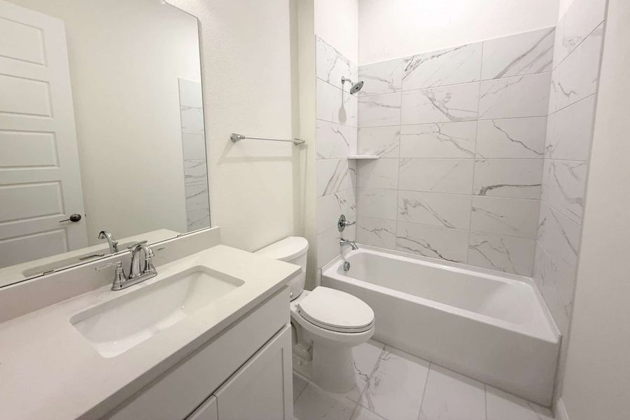 Furnished interior view inside a new home in Ridge Park Estates, Royse City (Image 9).