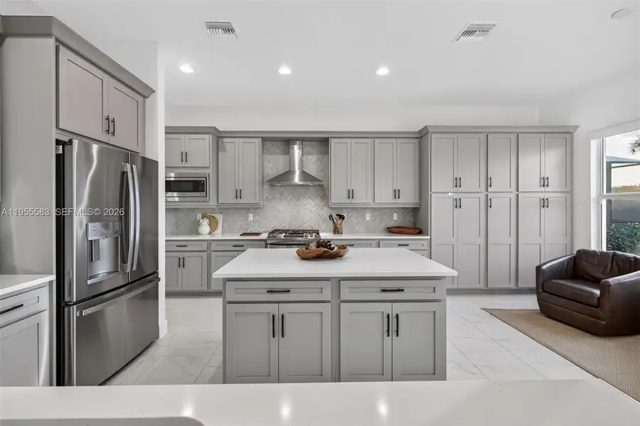 Furnished interior view inside a new home in , Port St. Lucie (Image 26).