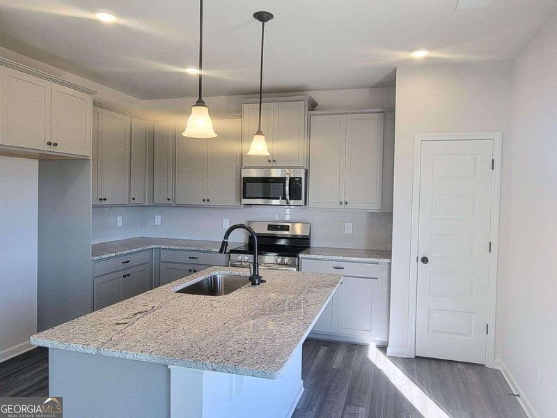 Furnished interior view inside a new home in Bryson Farms, Byron (Image 2).