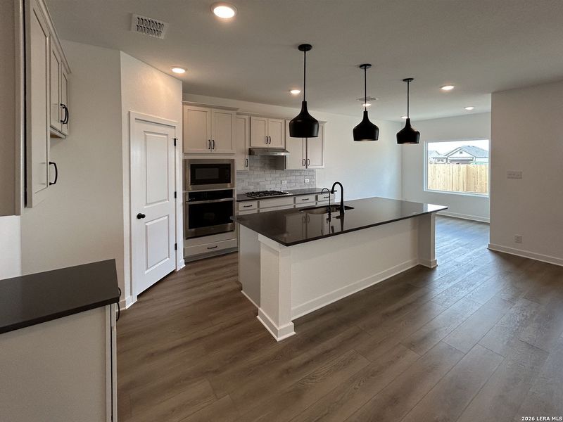 Furnished interior view inside a new home in Hennersby Hollow, San Antonio (Image 13).