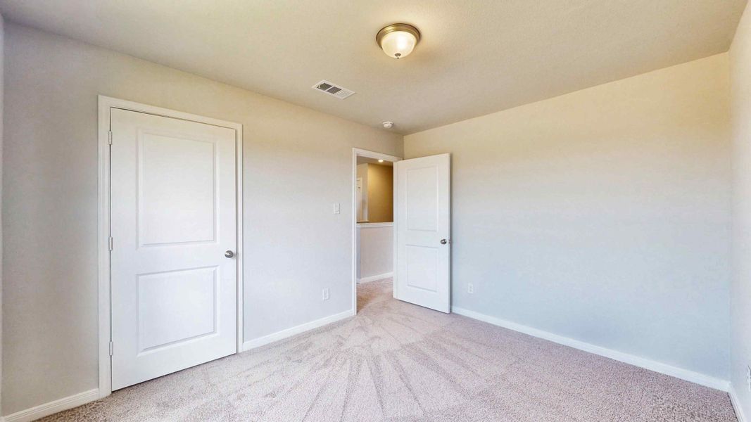 A room with white doors.