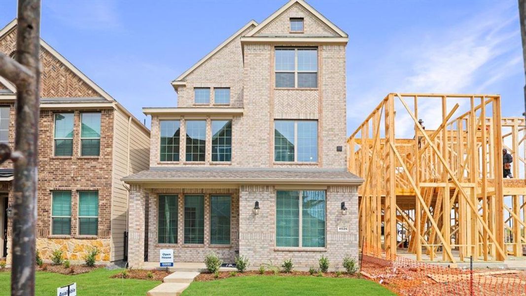 Front exterior of a new home in Mustang Square, Plano, TX, highlighting curb appeal (Image 1). Front exterior of a new home in Mustang Square, Plano, TX, highlighting curb appeal (Image 1).