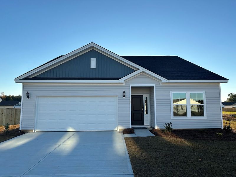 Front exterior of a new home in Garden Grove, Conway, SC, highlighting curb appeal (Image 1).