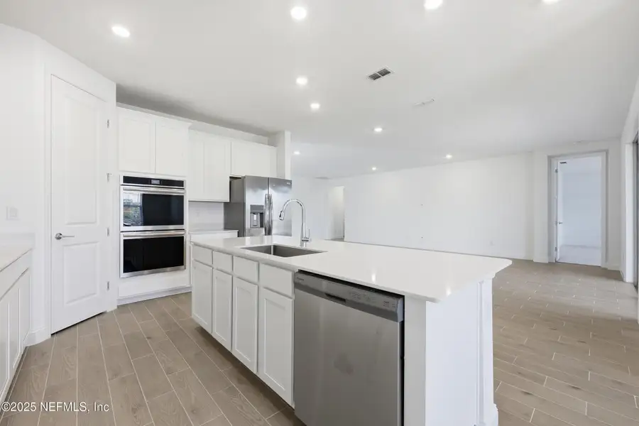 Furnished interior view inside a new home in Edenbrooke at Hyland Trail | 55+: Edenbrooke at Hyland Trail 60s, Green Cove Springs (Image 5). Furnished interior view inside a new home in Edenbrooke at Hyland Trail | 55+: Edenbrooke at Hyland Trail 60s, Green Cove Springs (Image 5).