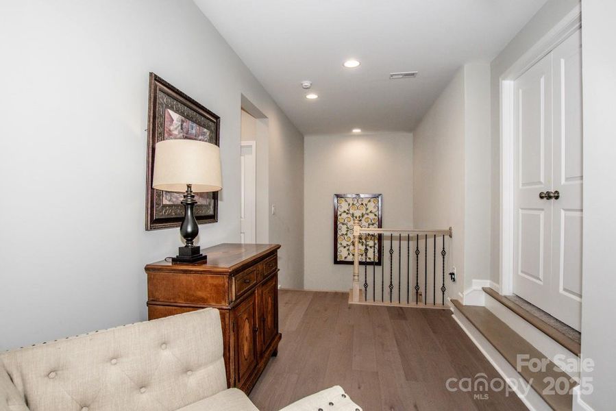 Furnished interior view inside a new home in Signature at Reid's Cove, Mooresville (Image 14).