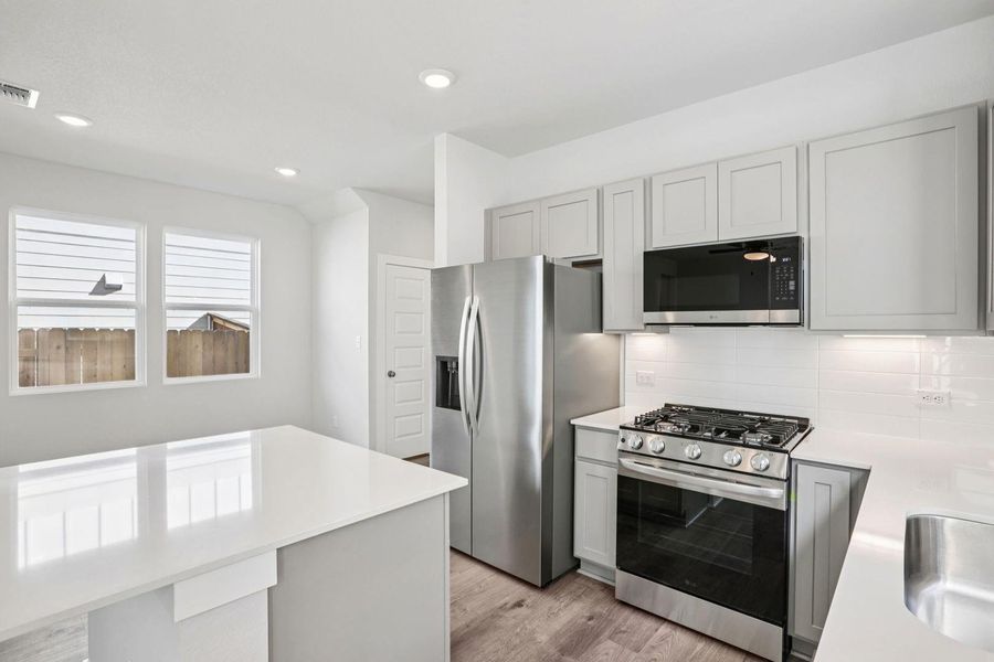 Furnished interior view inside a new home in Avery Centre, Round Rock (Image 9).
