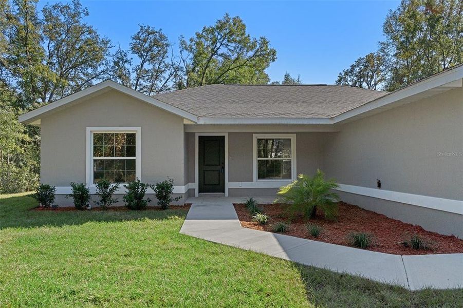 Exterior details and patio area of a home in , Citrus Springs (Image 25). Exterior details and patio area of a home in , Citrus Springs (Image 25).