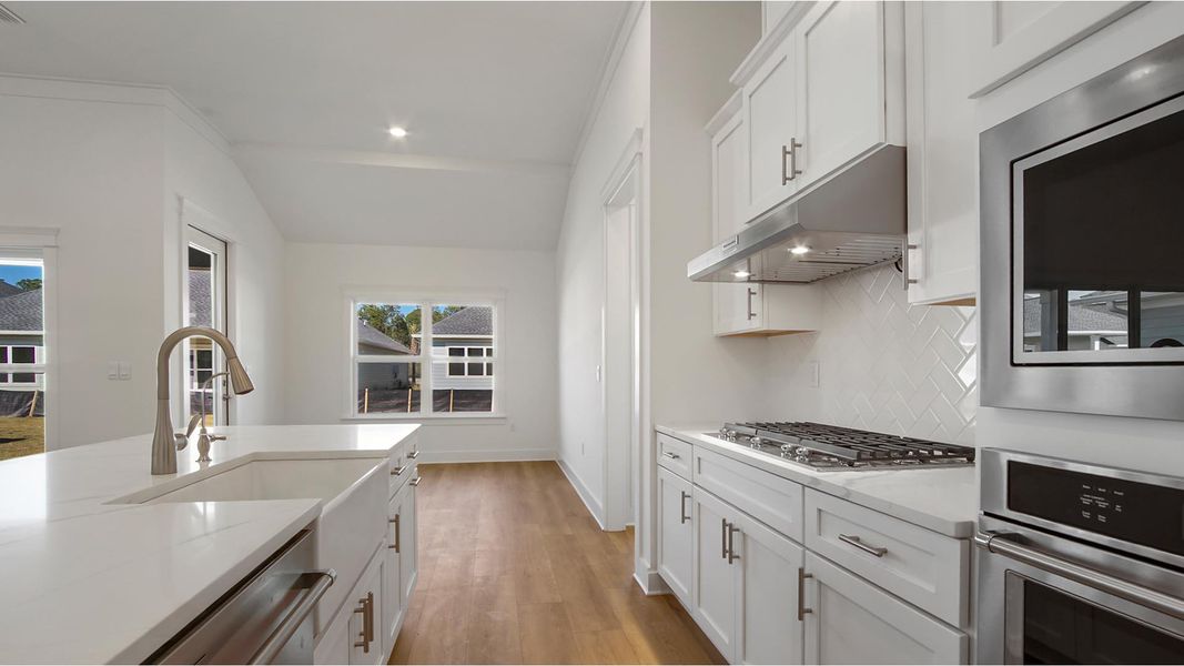 Furnished interior view inside a new home in Breakfast Point East Phase II, Panama City Beach (Image 7).