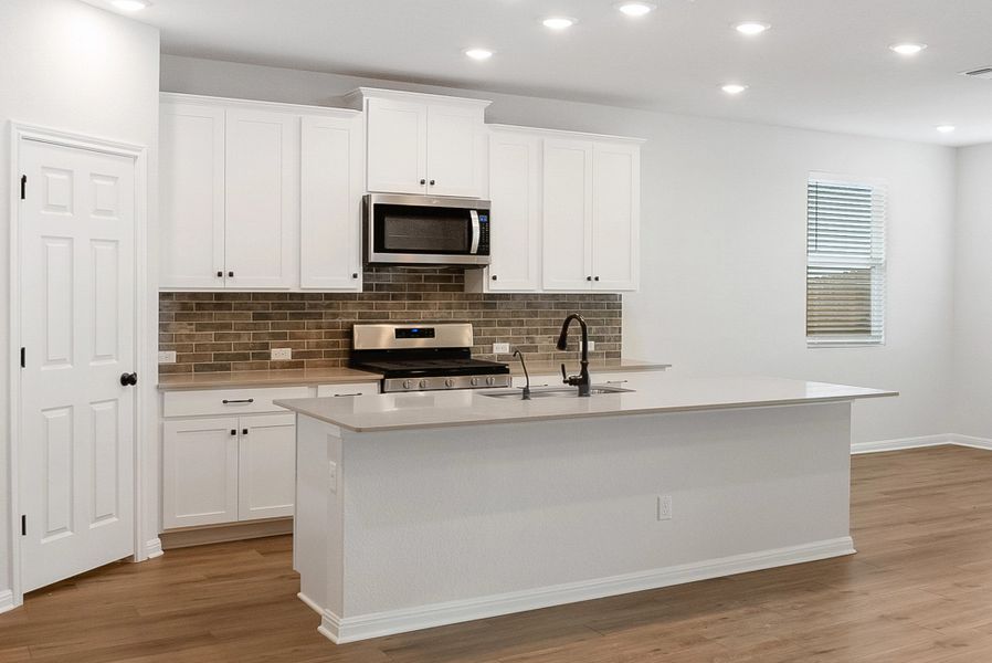 Representative furnished interior of a home built from the Cartwright by Ashton Woods in Rolling Glen, Hutto (Image 5).
