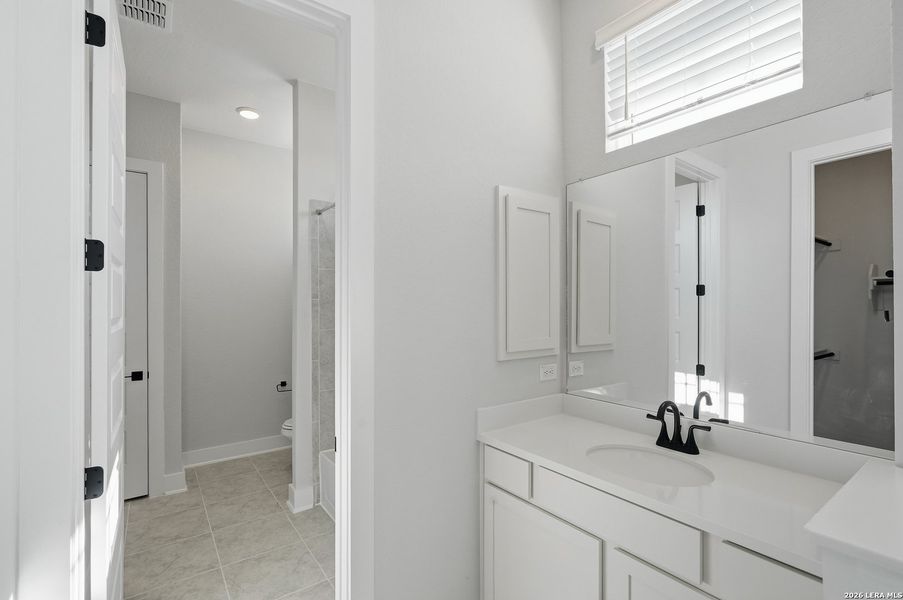 Furnished interior view inside a new home in Potranco Oaks, Castroville (Image 30).