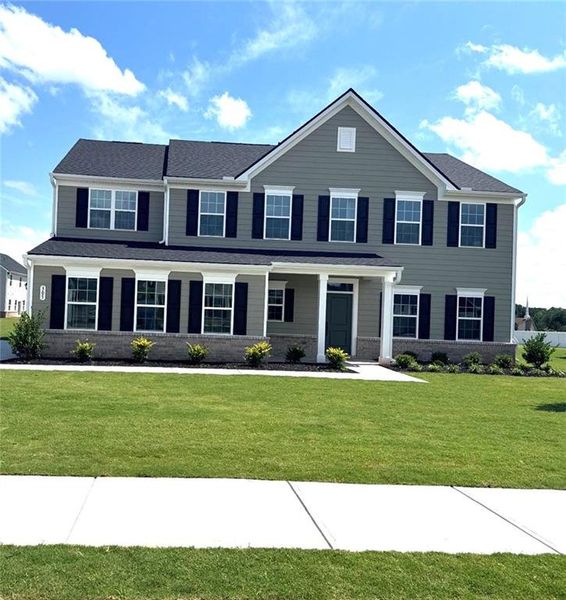 Front exterior of a new home in , Locust Grove, GA, highlighting curb appeal (Image 2). Front exterior of a new home in , Locust Grove, GA, highlighting curb appeal (Image 2).