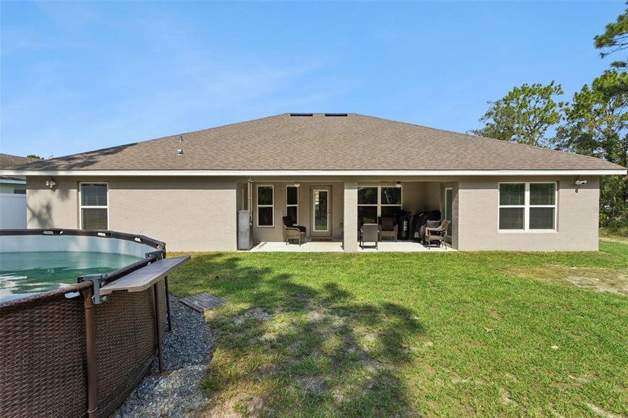 Exterior details and patio area of a home in Royal Highlands, Weeki Wachee (Image 3).