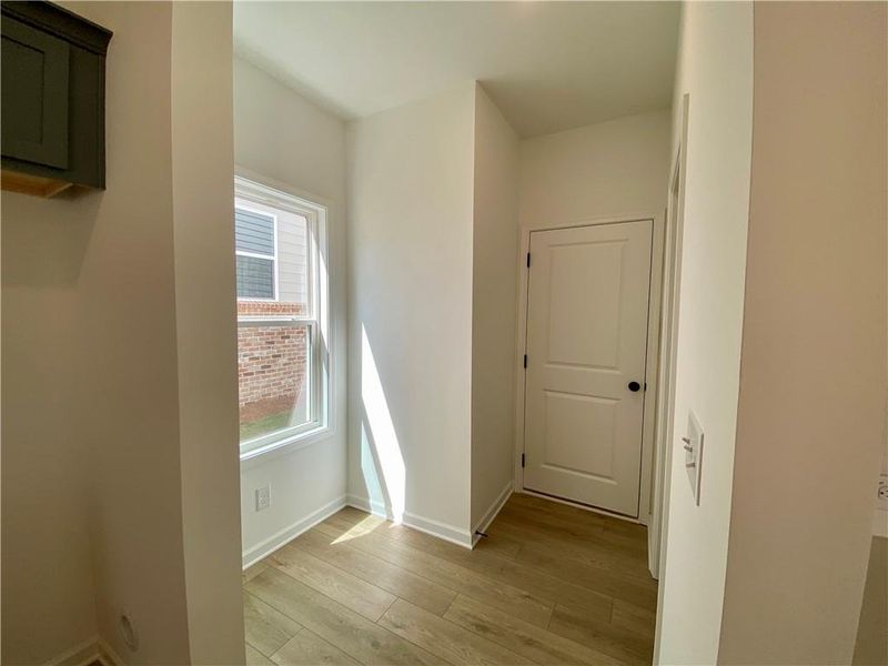 Spacious, unfurnished interior of a new home in Eastlyn Crossing, Flowery Branch (Image 28).