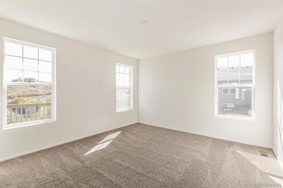 Spacious, unfurnished interior of a new home in Terrain Oak Valley, Castle Rock (Image 29).