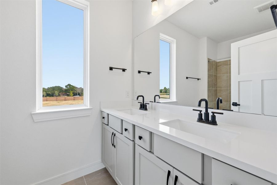 Furnished interior view inside a new home in Bridgeland Central, Cypress (Image 15).
