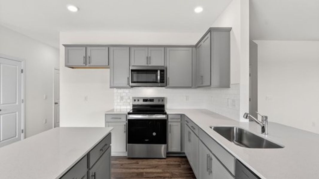Furnished interior view inside a new home in Shahbain Reserve, Raeford (Image 6).