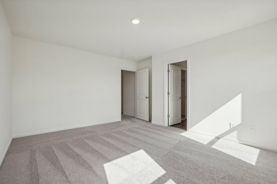 Representative unfurnished interior of a home built from the Dahlia by Starlight Homes in Walker Station, Wilson (Image 26).