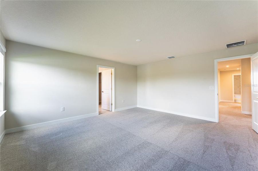 Spacious, unfurnished interior of a new home in The Palms at Venetian Bay, New Smyrna Beach (Image 18). Spacious, unfurnished interior of a new home in The Palms at Venetian Bay, New Smyrna Beach (Image 18).