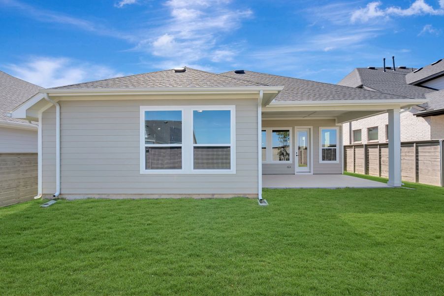 Exterior details and patio area of a home in Treeline, Justin (Image 3).