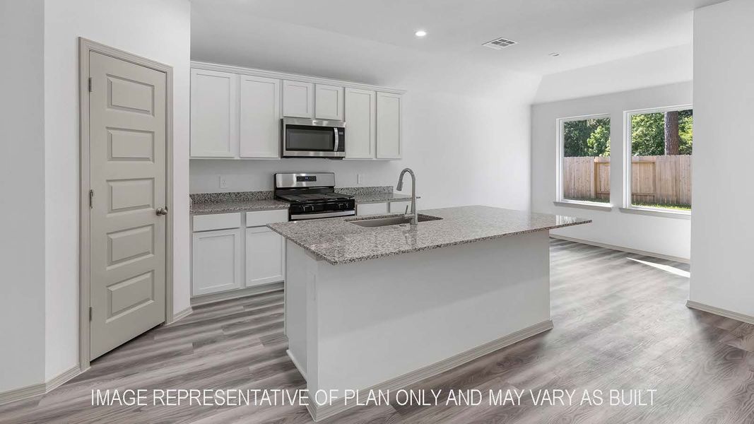 Furnished interior view inside a new home in Reserve at Mallard Lakes, Orange (Image 4).