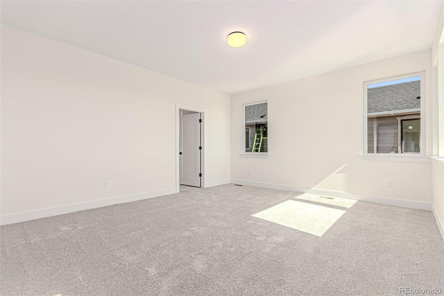Spacious, unfurnished interior of a new home in West Grange, Longmont (Image 34).