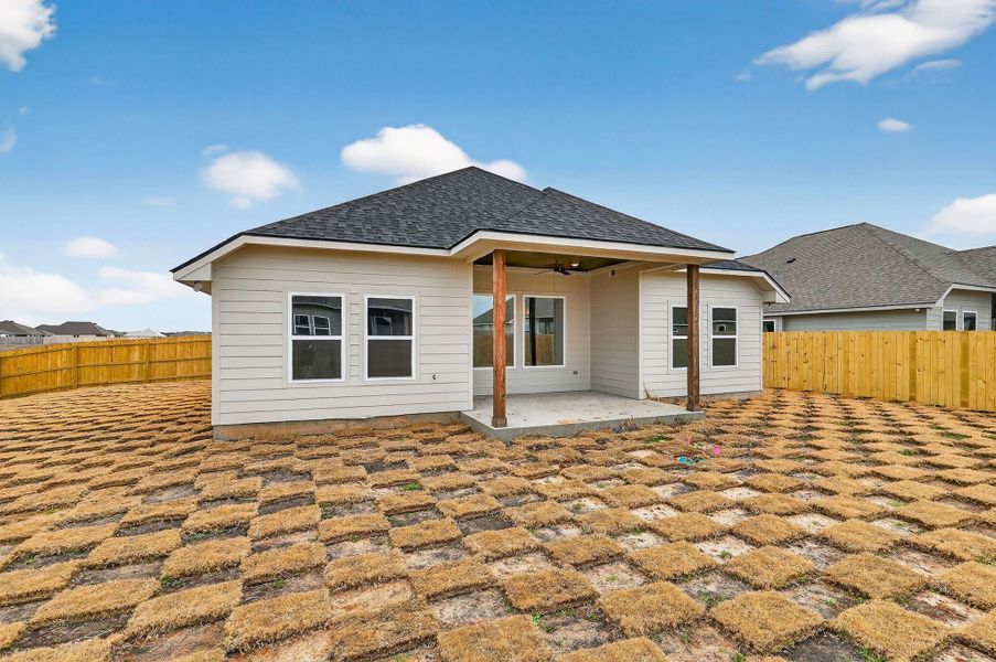 Exterior details and patio area of a home in , Snook (Image 24).