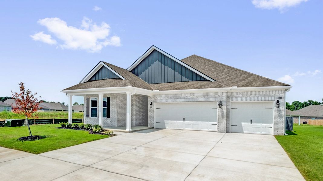 Front exterior of a new home in Riverwood Gardens, Oakland, TN, highlighting curb appeal (Image 2).