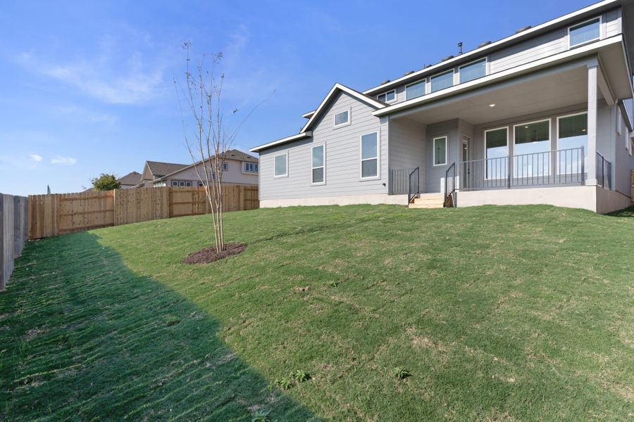 Exterior details and patio area of a home in Lariat, Liberty Hill (Image 3).