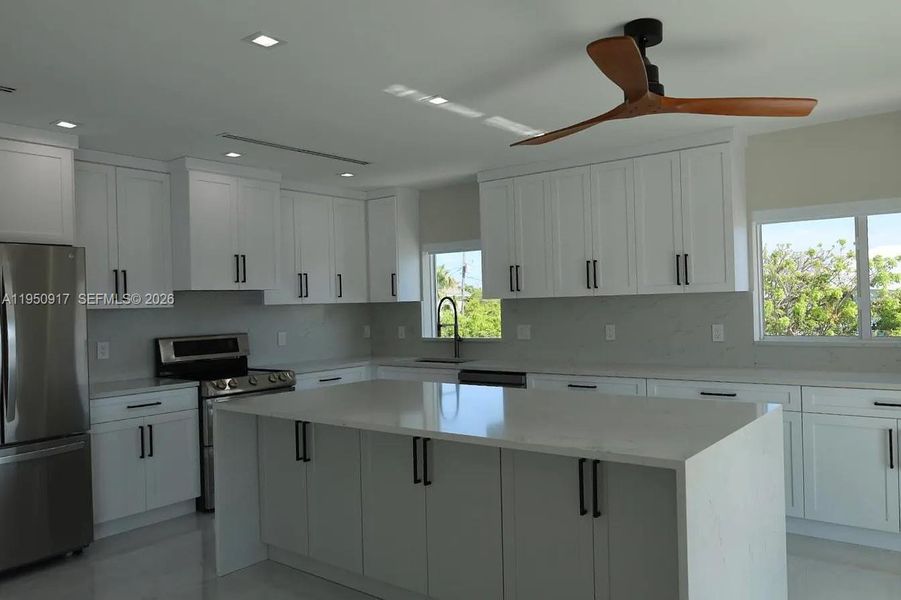 Furnished interior view inside a new home in , Tavernier (Image 8).