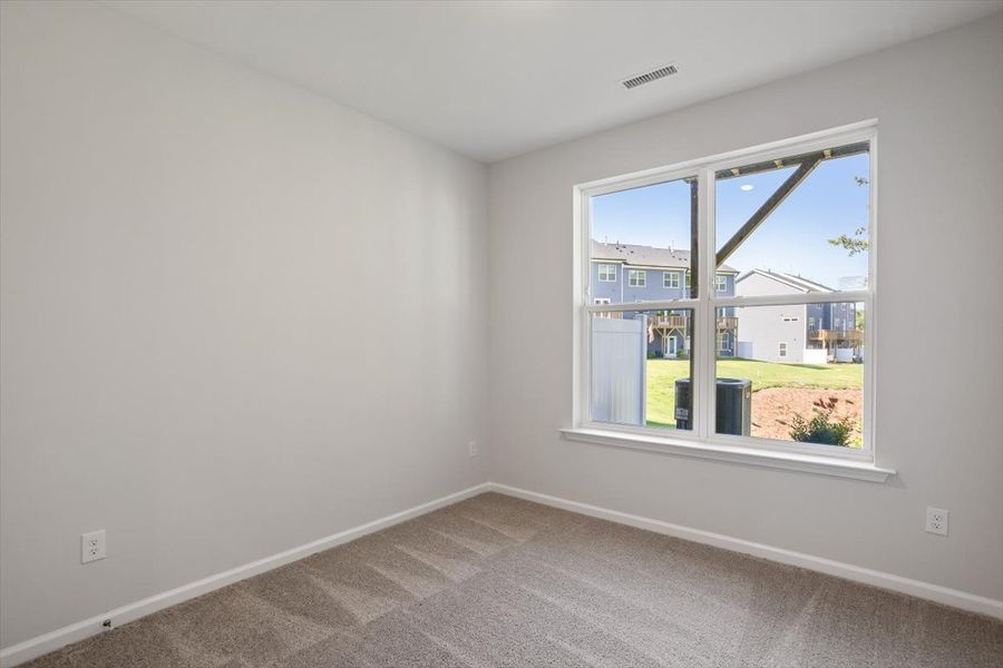 Spacious, unfurnished interior of a new home in Sweetbrier, Durham (Image 31).