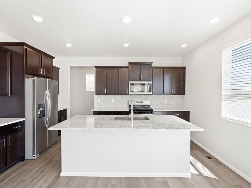 Furnished interior view inside a new home in Paint Brush Hills, Peyton (Image 3).