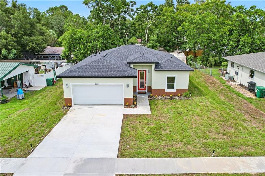 Front exterior of a new home in , Citrus Springs, FL, highlighting curb appeal (Image 22).