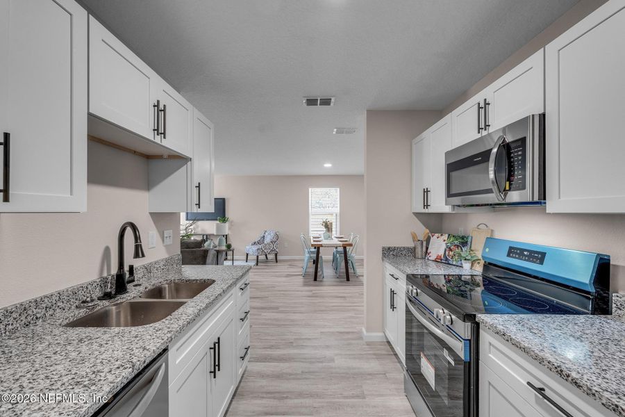 Furnished interior view inside a new home in , Jacksonville (Image 12).