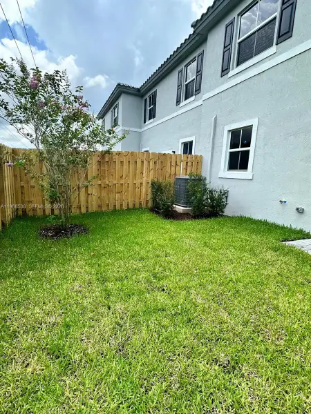 Exterior details and patio area of a home in , Coral Springs (Image 3). Exterior details and patio area of a home in , Coral Springs (Image 3).