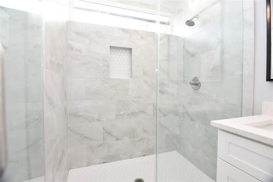 Primary bath with large walk in shower