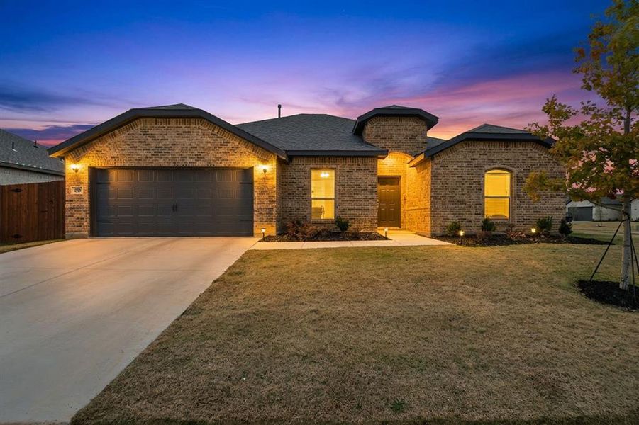 Front exterior of a new home in , Azle, TX, highlighting curb appeal (Image 1).