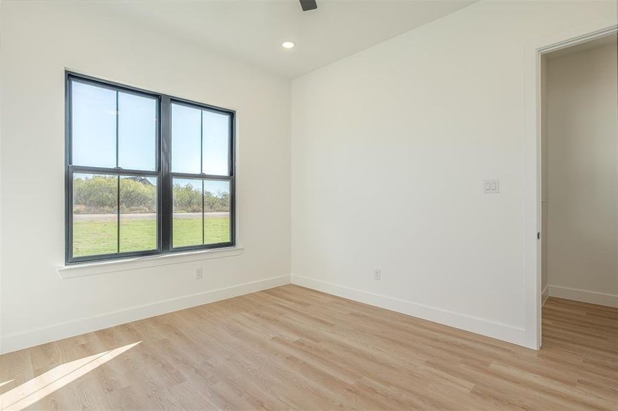 Empty room featuring light hardwood / wood-style flooring