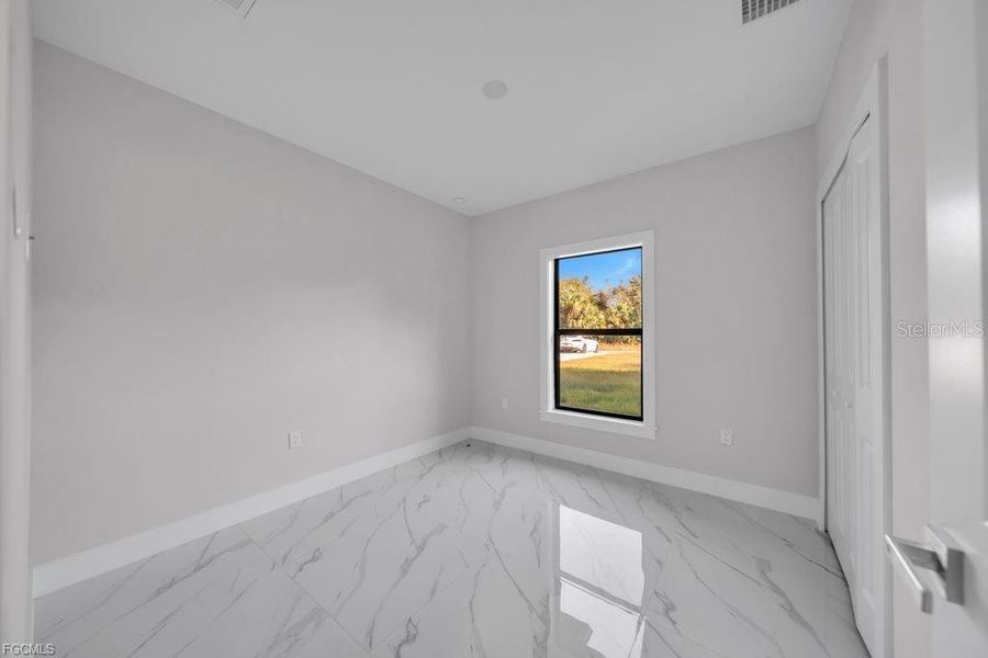 Spacious, unfurnished interior of a new home in , Lehigh Acres (Image 18).