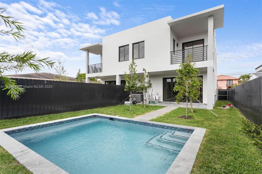 Front exterior of a new home in , Miami, FL, highlighting curb appeal (Image 23).