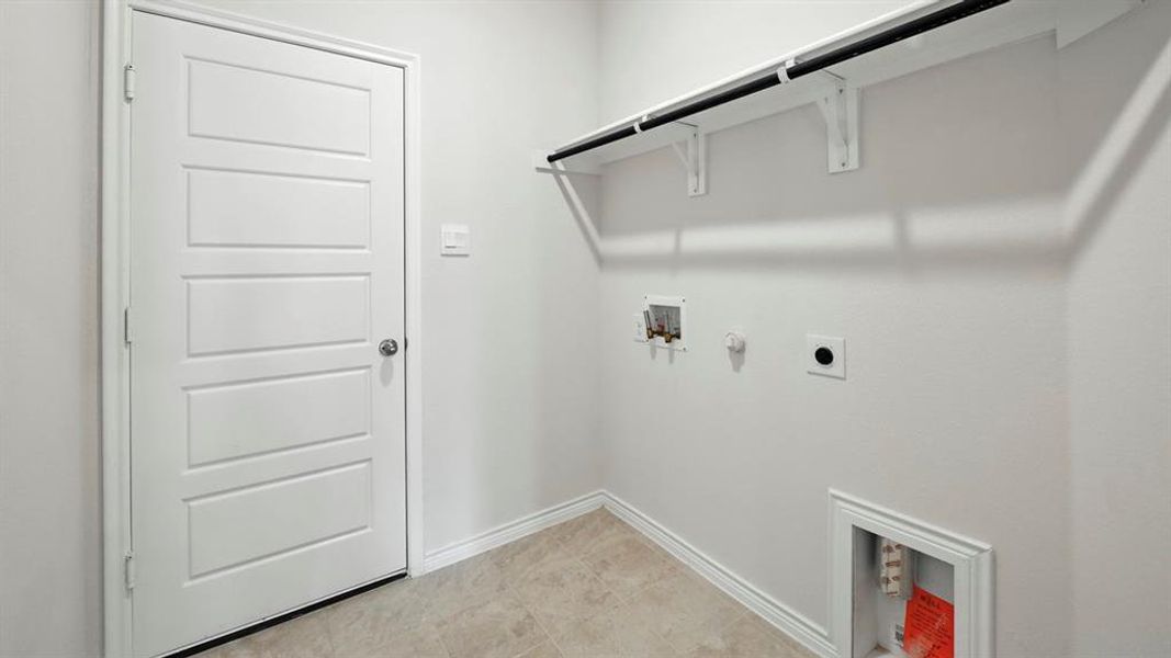 Laundry room featuring hookup for a gas dryer, hookup for a washing machine, and electric dryer hookup