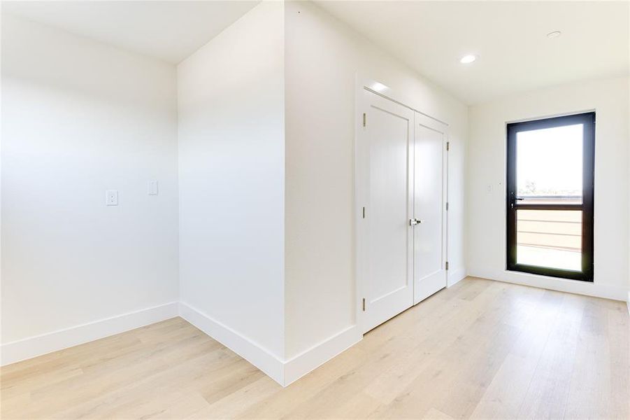 Entrance foyer with light hardwood / wood-style floors